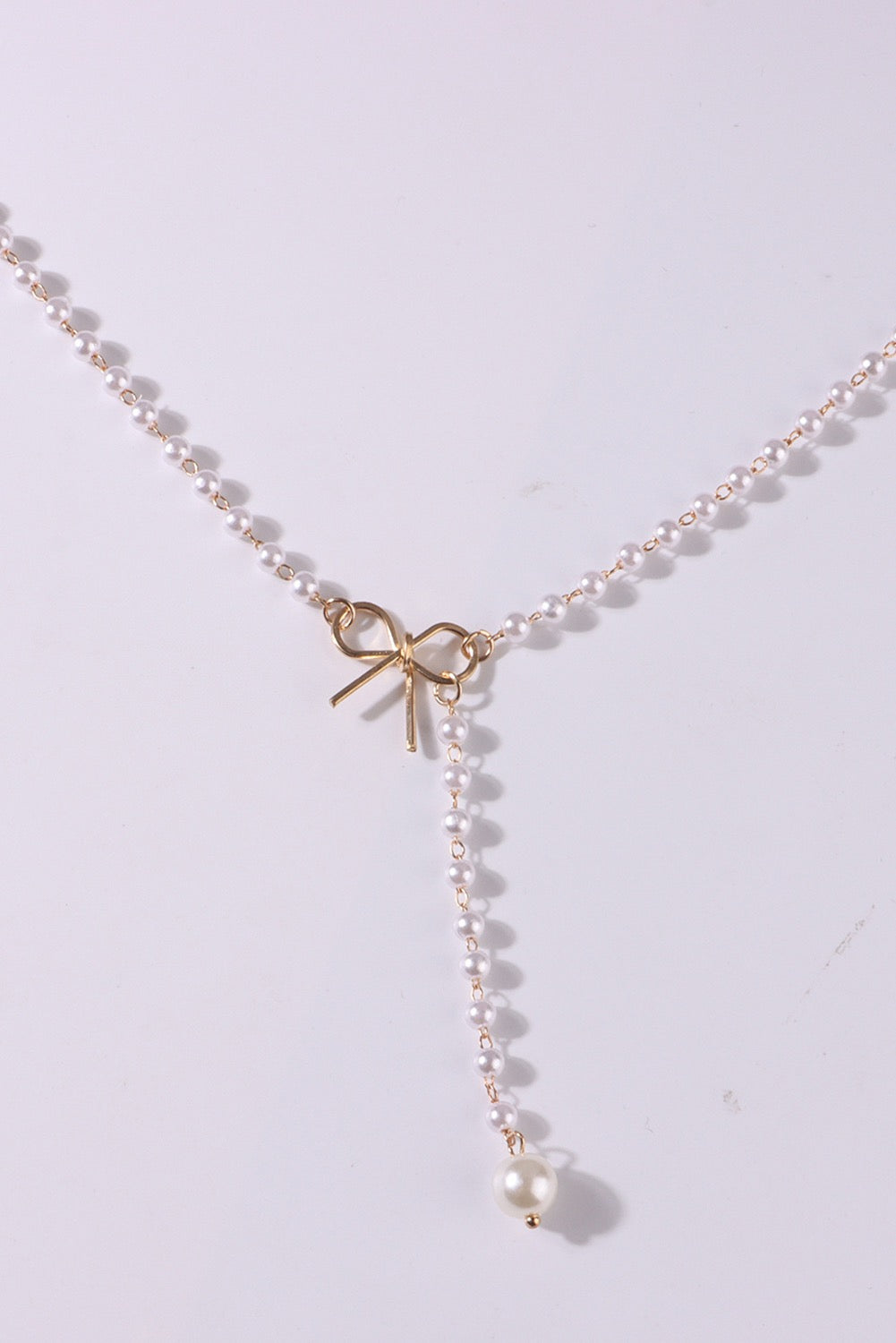 Gold Bow Pearl Chain Necklace